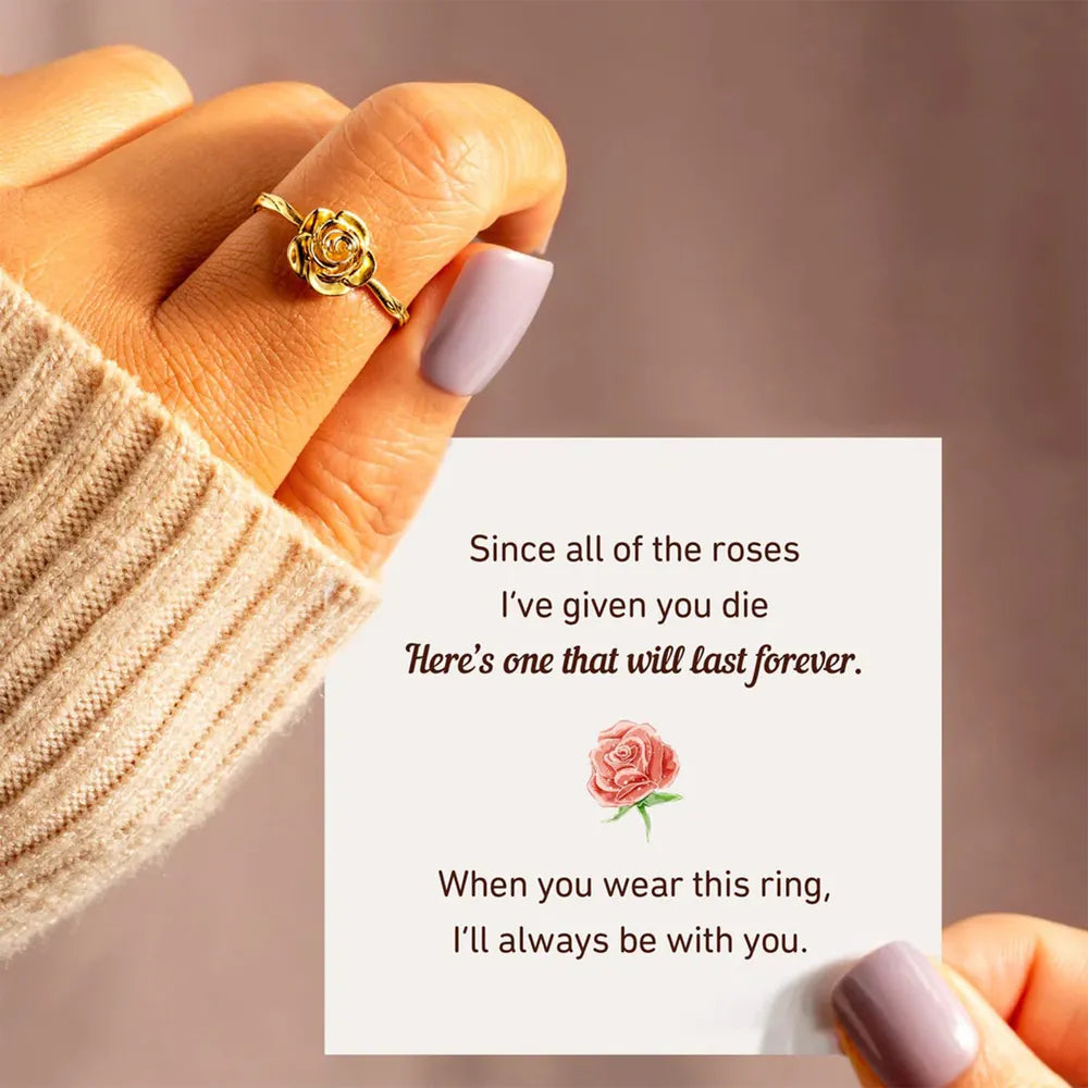 Rose ring shown beside a romantic message card