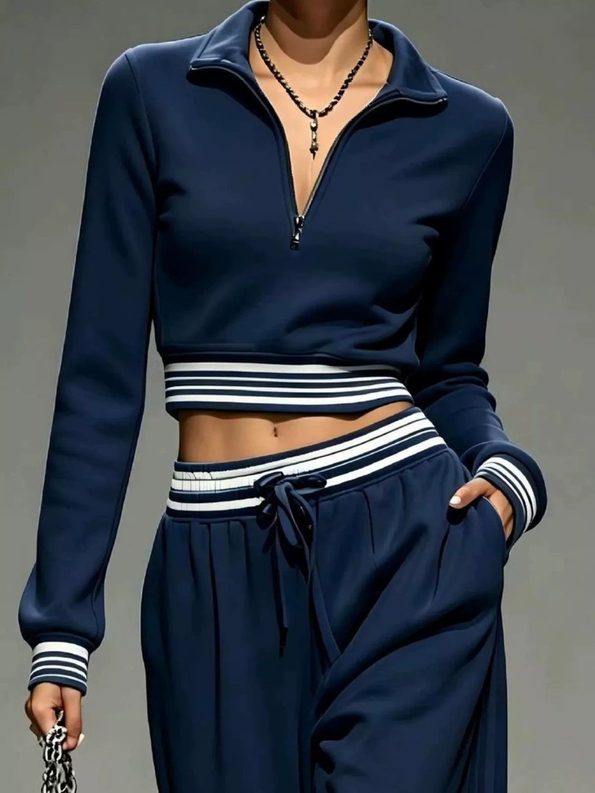 Navy matching pants showing loose wide legs, drawstring waist and side pockets