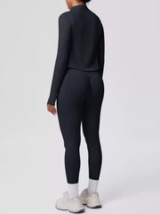 Back view showing fit of tank & zip-up jacket and leggings three-piece active set