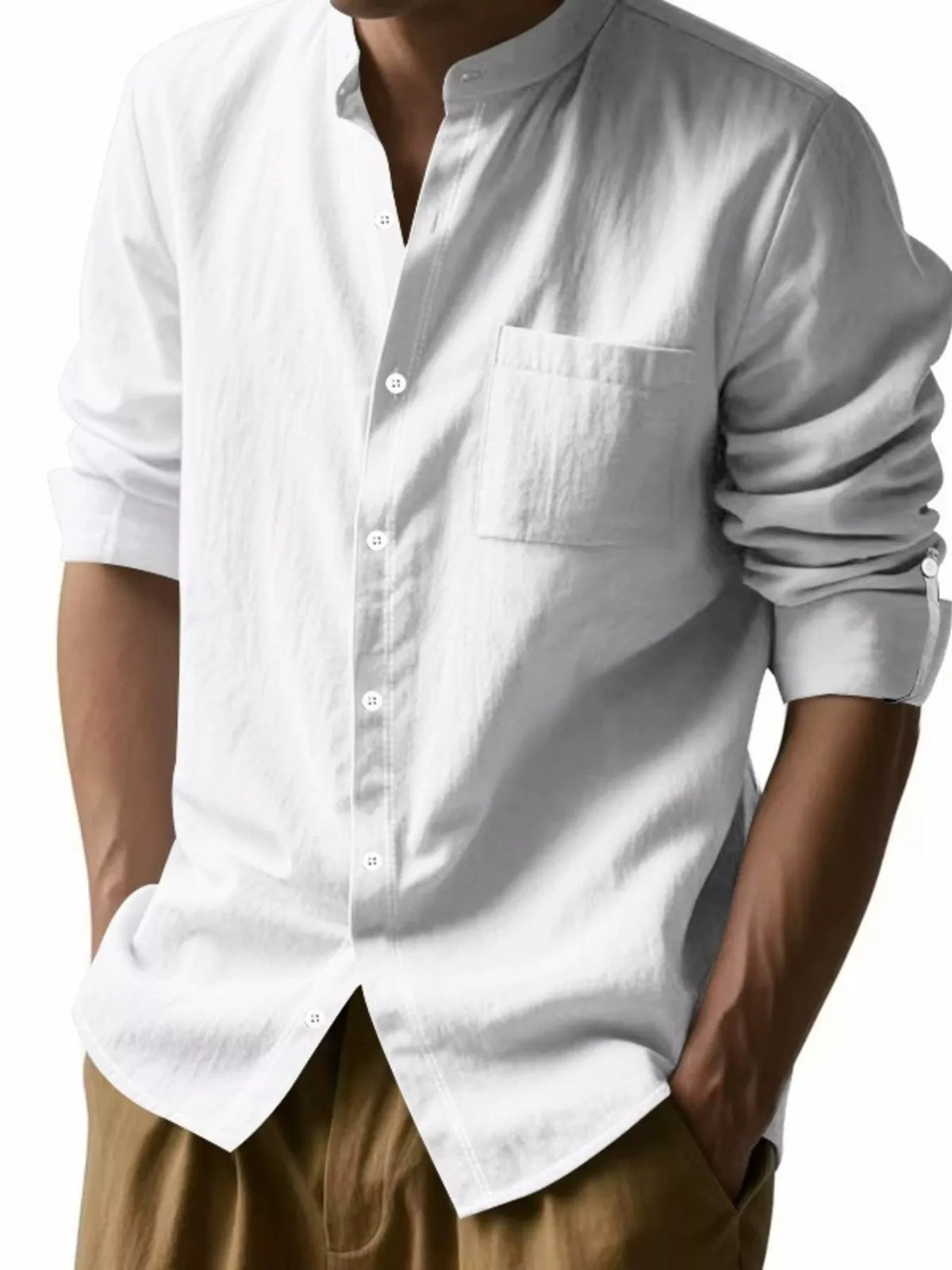 White long-sleeve button-up shirt shown closer with open collar and chest pocket