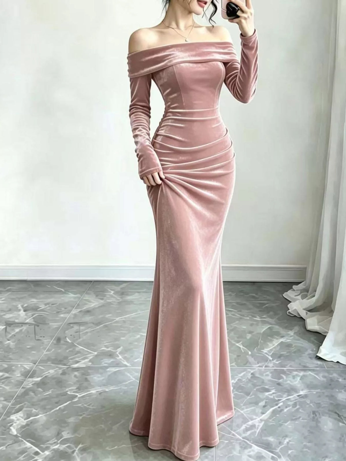 Blush pink velvet off-shoulder long-sleeve maxi dress, front view