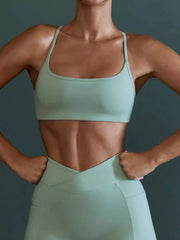 Front view of seamless cross-waist cami and leggings active set