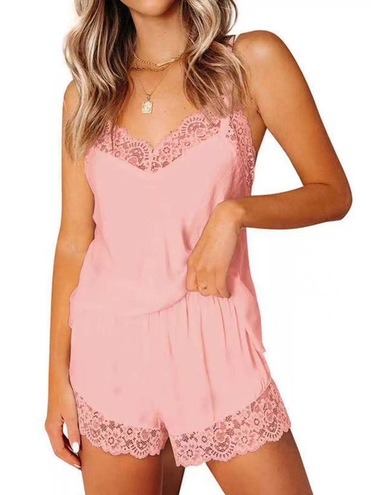 Pink spaghetti-strap camisole and matching lace-trim shorts, front view