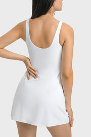 Back view of the white sports dress with a scoop back.