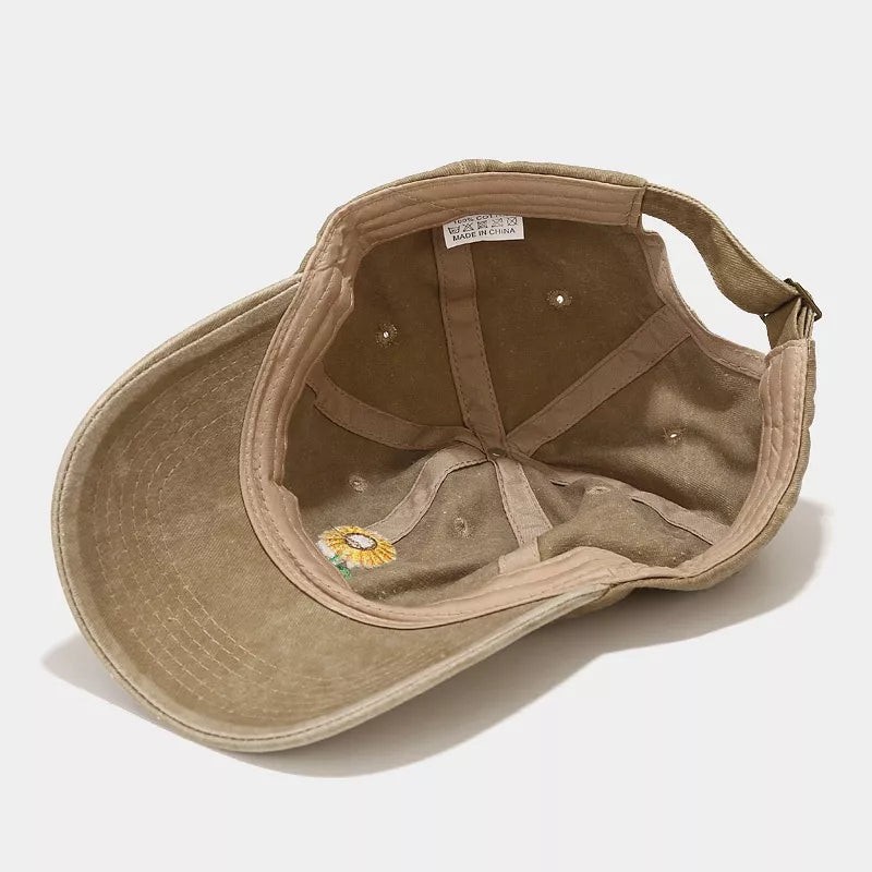 Inside view of the khaki baseball cap and adjustable back strap