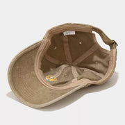 Inside view of the khaki baseball cap and adjustable back strap