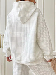 Back view of white textured hooded sweatshirt