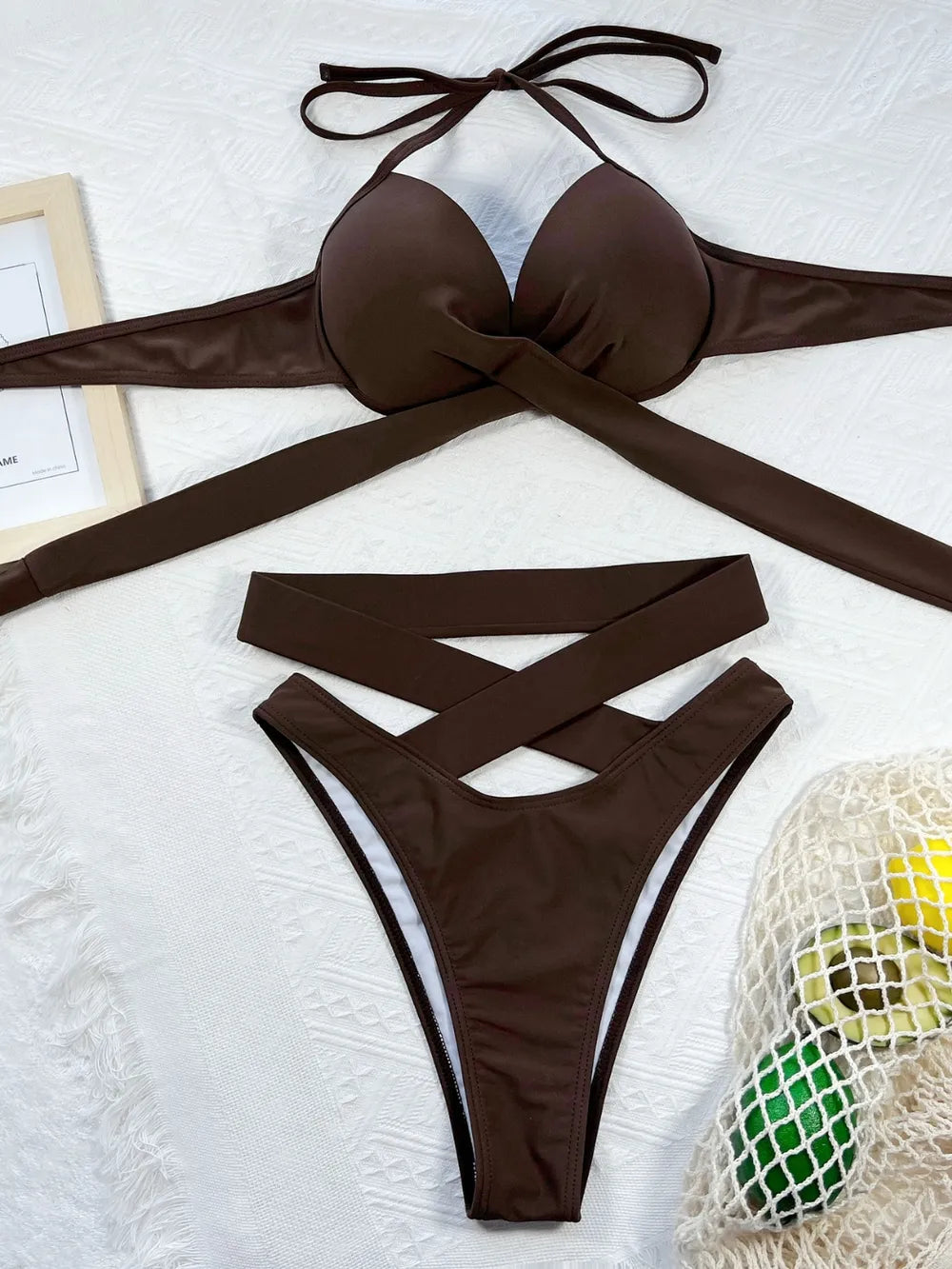 Brown crisscross halter bikini set laid flat, front view