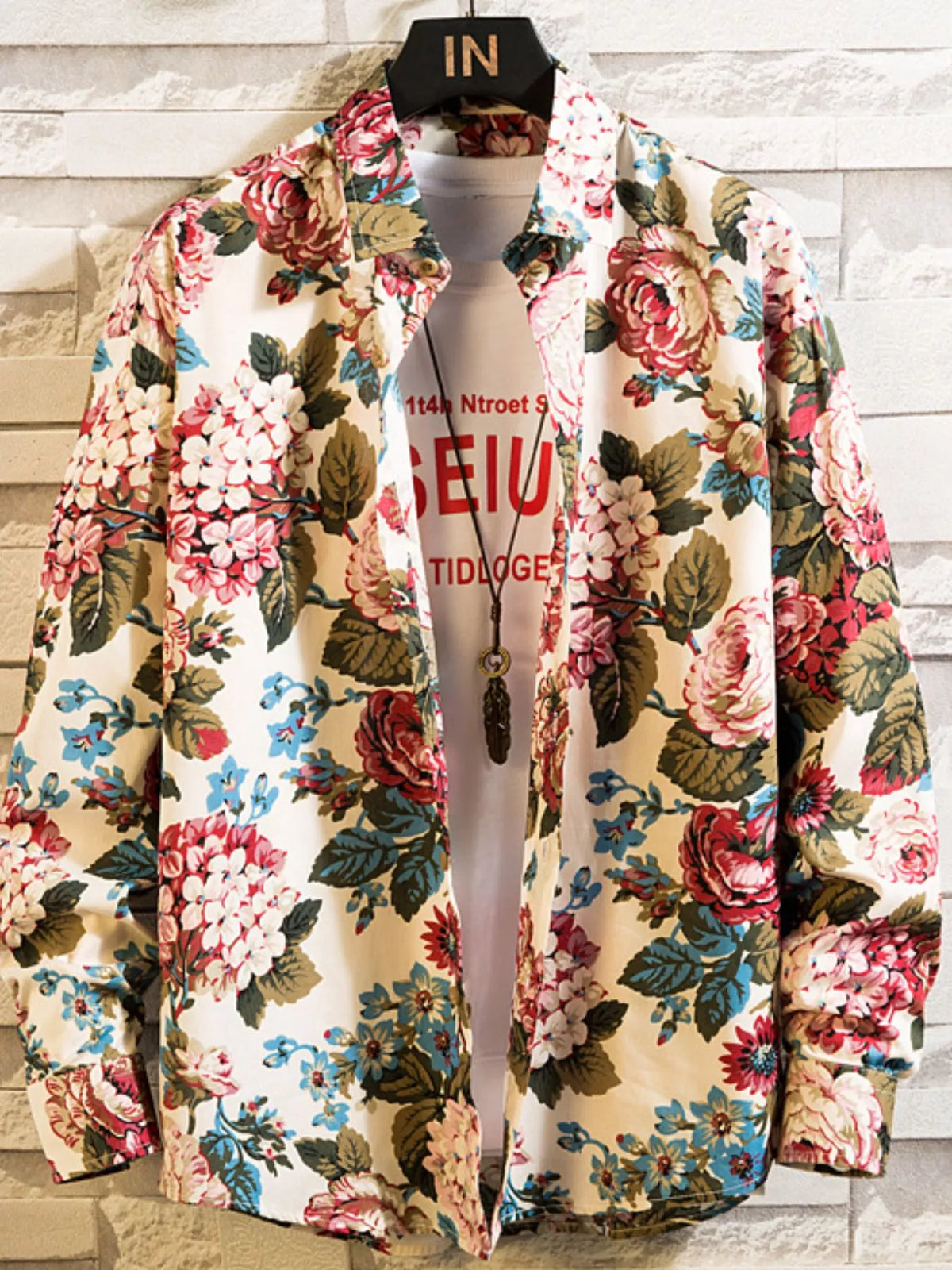 Cream shirt with large multicolor floral print, front view
