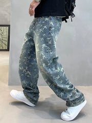 Opposite side view of blue bird-print jeans in a walking pose