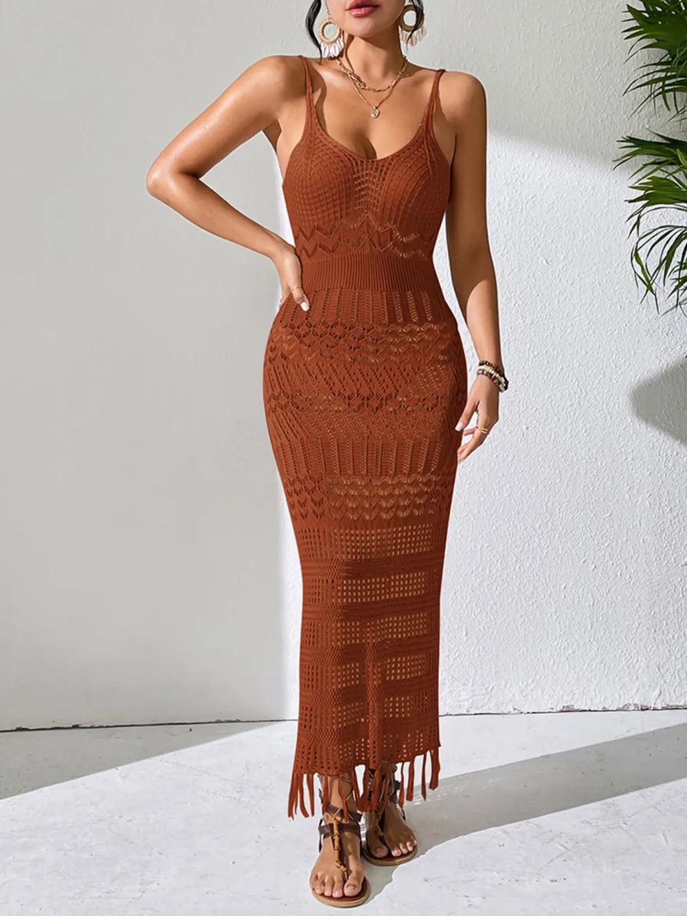 Full front view of a rust openwork cover-up dress with scoop neckline and patterned bands
