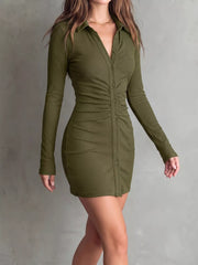 Front view of olive green mini dress with pointed collar and center buttons.