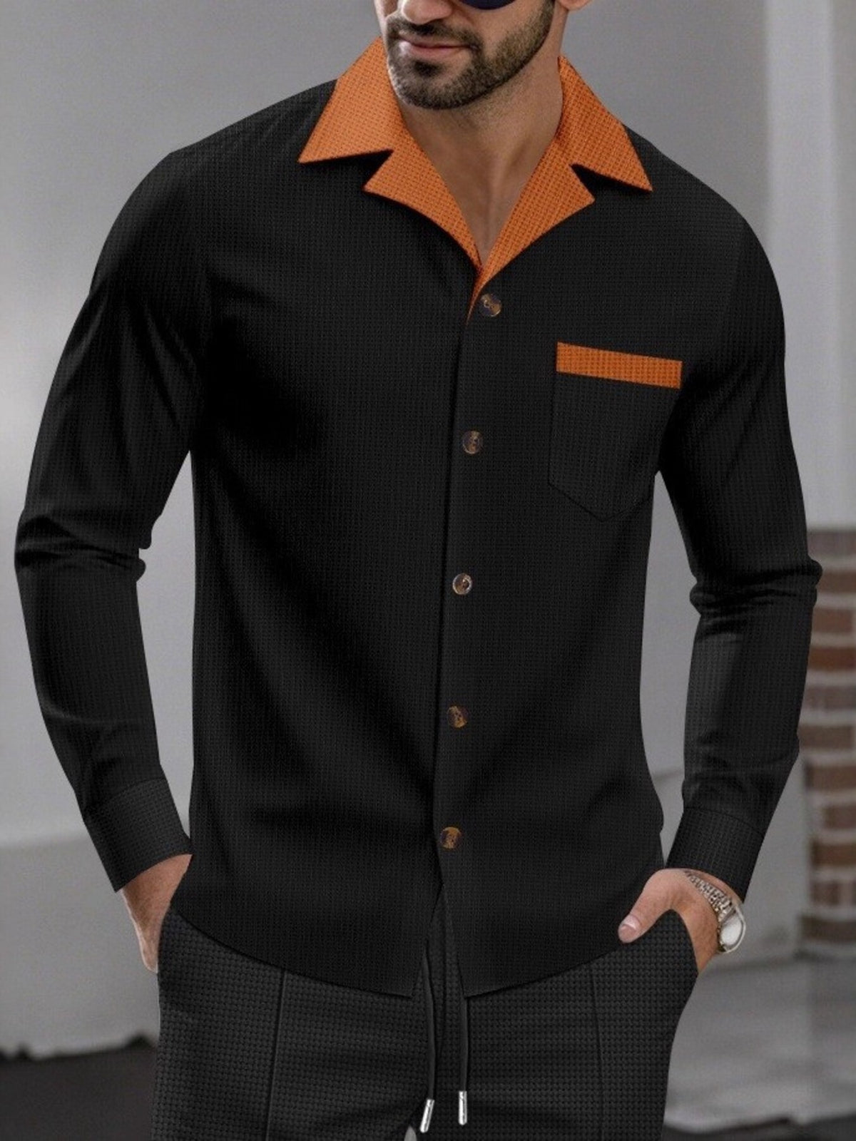 Front view of a button-up shirt with a contrasting collar