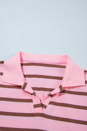 Close-up of striped shirt collar and top buttons.