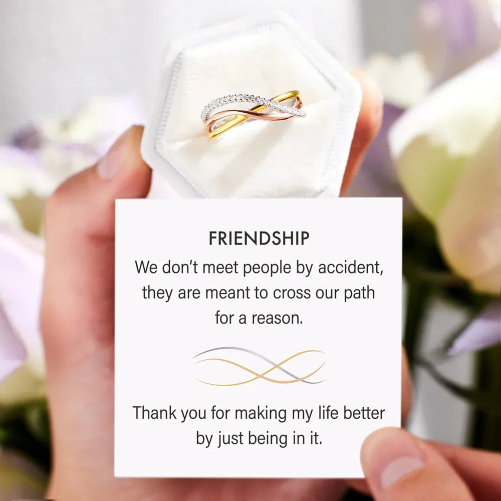 Crisscross ring displayed with a friendship message card