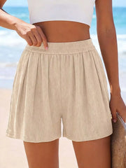 Beige ribbed high-waisted shorts shown from the front