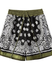 Black floral and paisley shorts with olive waistband