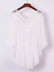 Close view of crochet trim on the white cover-up dress
