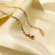 Gold zircon bracelet worn on wrist