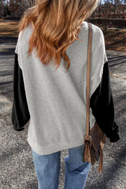 Back view of gray contrast-sleeve sweatshirt