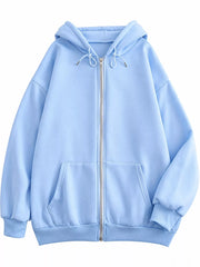 Front view of the light blue oversized zip-up hoodie with drawstring hood and pockets