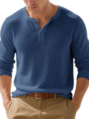 Front view of a blue long-sleeve Henley shirt with a short button placket.