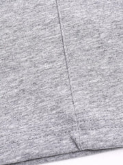 Detail of gray T-shirt shoulder seam and soft knit fabric
