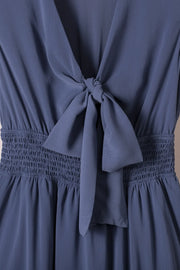 Close-up of front tie and smocked waist