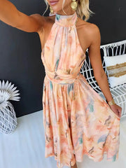 Close view of floral halter neckline and gathered waist on maxi dress
