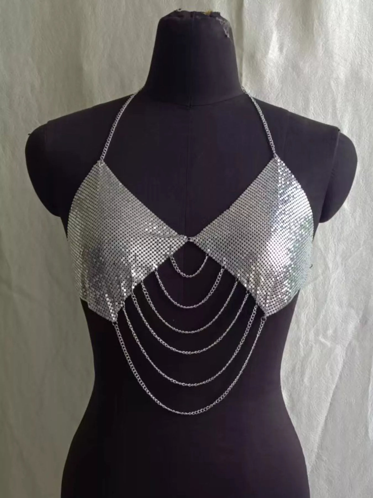 Silver chainmail halter cami top with chain drapes, front view on mannequin