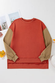 Front product view of rust sweatshirt laid flat