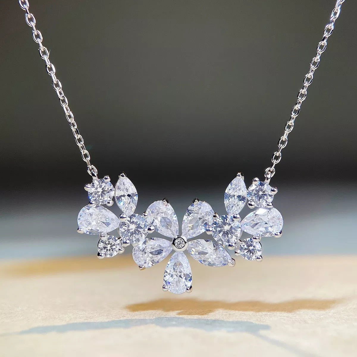 Silver-tone flower necklace with clear stones