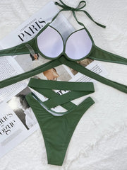 Inside of olive bikini top showing white cup lining