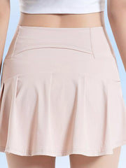 Pale pink active skirt, rear view with high waistband