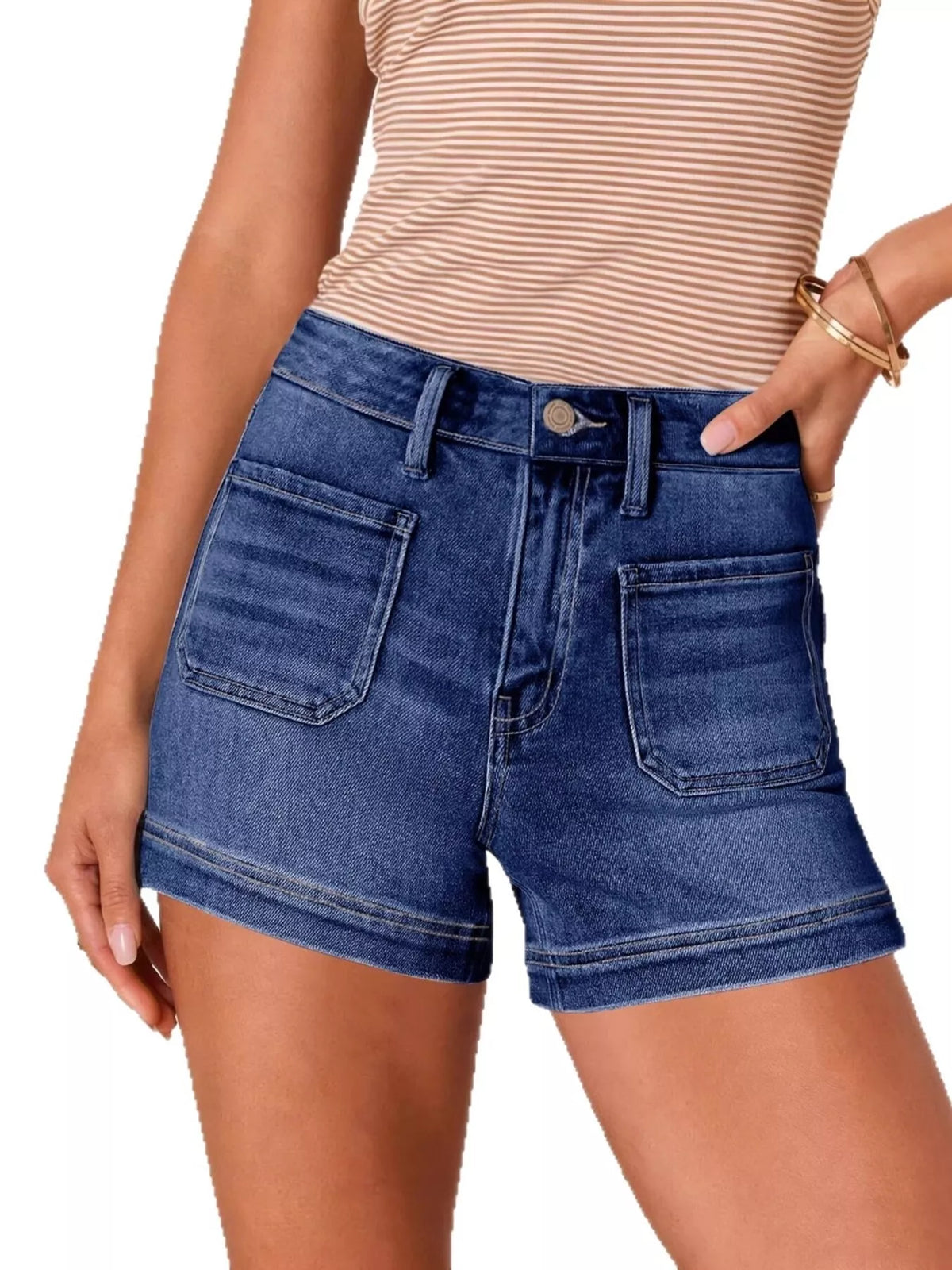 Front view of dark blue high-waisted denim shorts with rolled hems and front pockets.