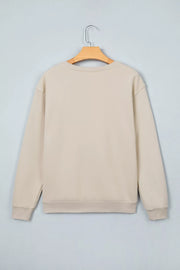 Back view of plain beige sweatshirt on hanger