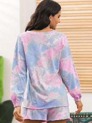 Back view of pastel tie-dye long-sleeve lounge top and matching shorts