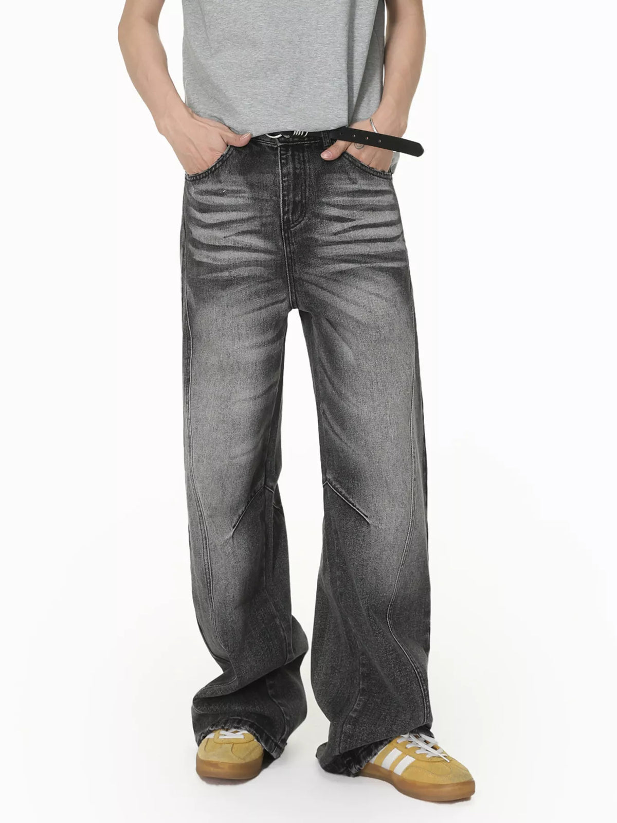 Front view of men's grey vintage-wash wide-leg jeans with faded thighs