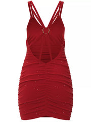 Back view of red dress with open strappy back
