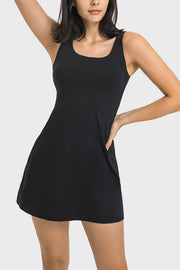 Front view of a black square-neck sports dress with a flared skirt.