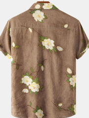Back of taupe shirt with cream floral print