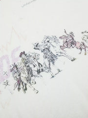 Close-up of black sketch-style graphic on white fabric