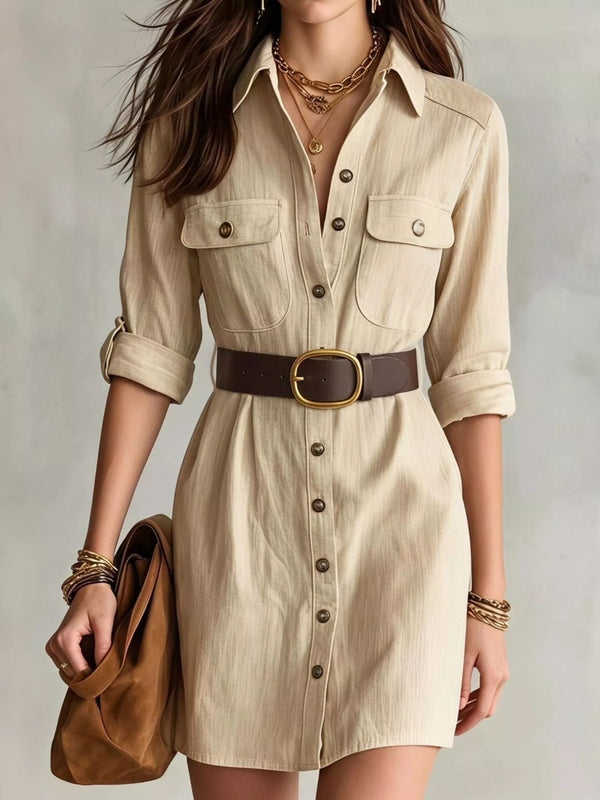 Tan button-front shirt dress with chest pockets and rolled sleeves, front view