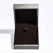 Open black jewelry presentation box