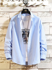 Light blue-and-white vertically striped button-up shirt, front view