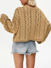 Women’s cable-knit half-button openwork sweater in tan back view