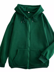 Front view of the dark green oversized zip-up hoodie with drawstrings and pockets