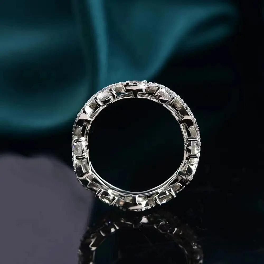 End-on view through the circular band showing its repeating stone-set pattern.