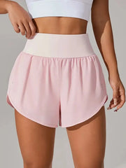 Pale pink active shorts with wide high-rise waistband, front view