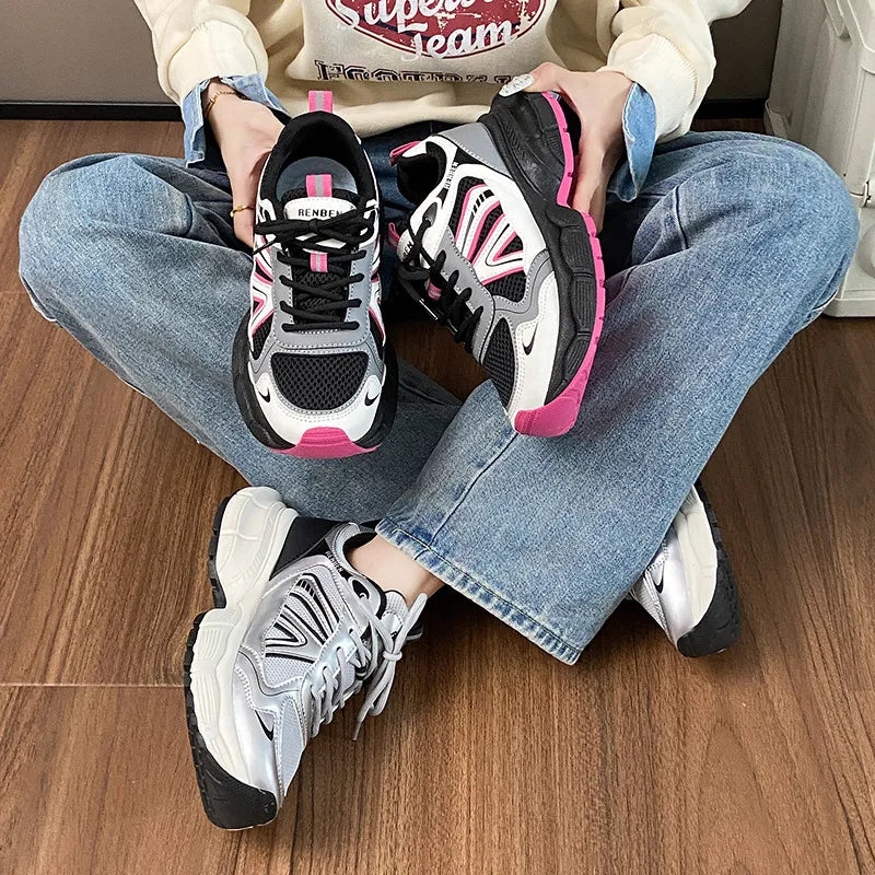Black, white and pink platform sneakers shown from above